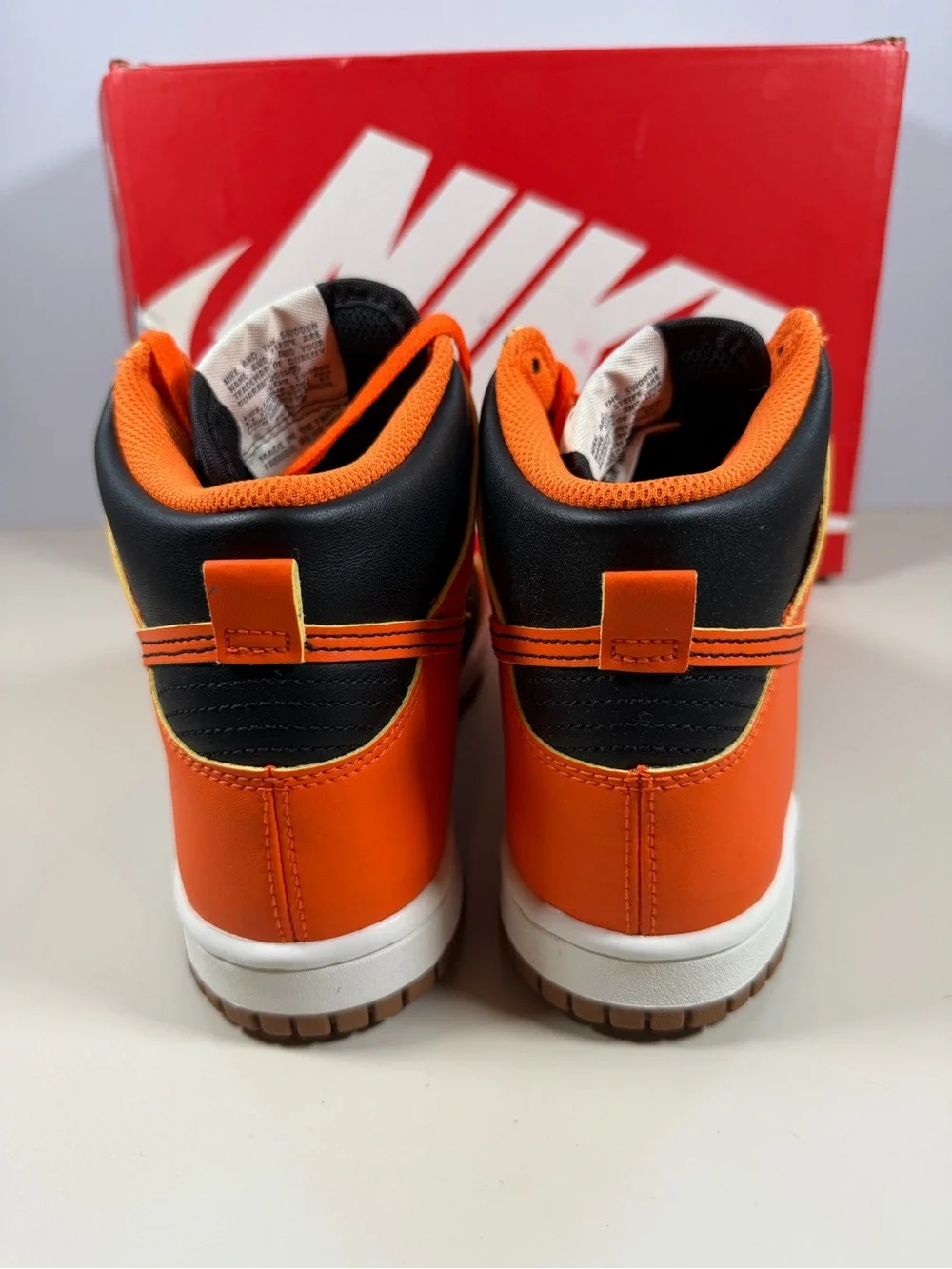 Nike Kids High-Top Sneakers in Orange and Black